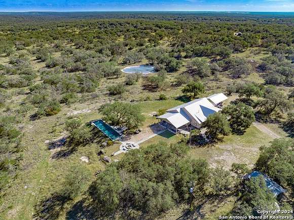 115 Acres of Land with Home for Sale in Hondo, Texas