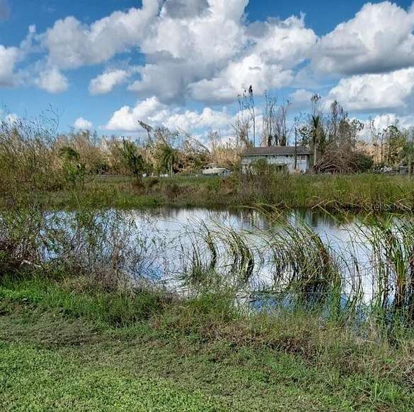 5 Acres of Residential Land with Home for Sale in Punta Gorda, Florida