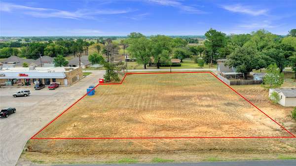 0.89 Acres of Commercial Land for Sale in Collinsville, Texas