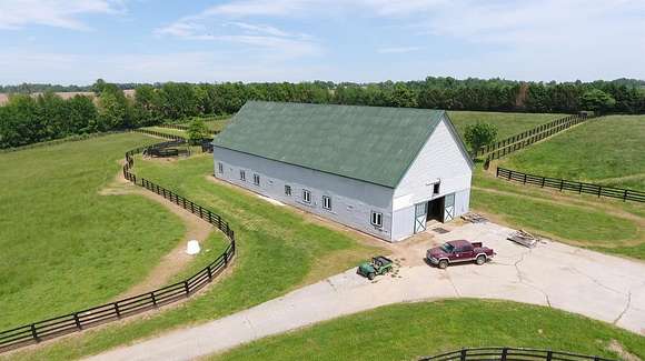 214 Acres of Land with Home for Sale in Versailles, Kentucky