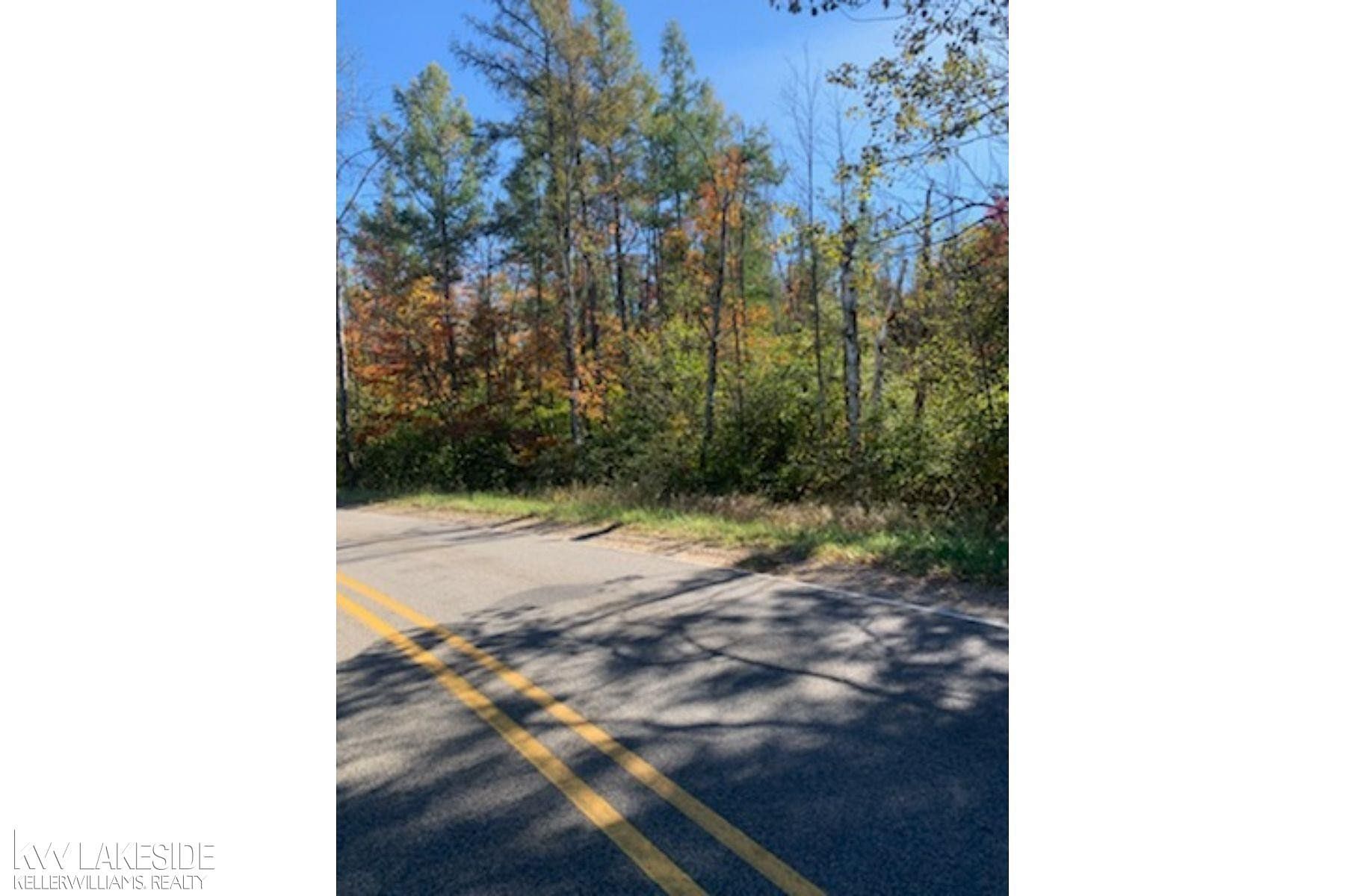 0.91 Acres of Residential Land for Sale in Prudenville, Michigan