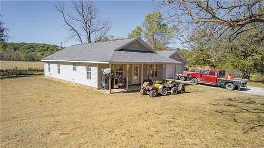 80 Acres of Agricultural Land with Home for Sale in Prairie Grove, Arkansas