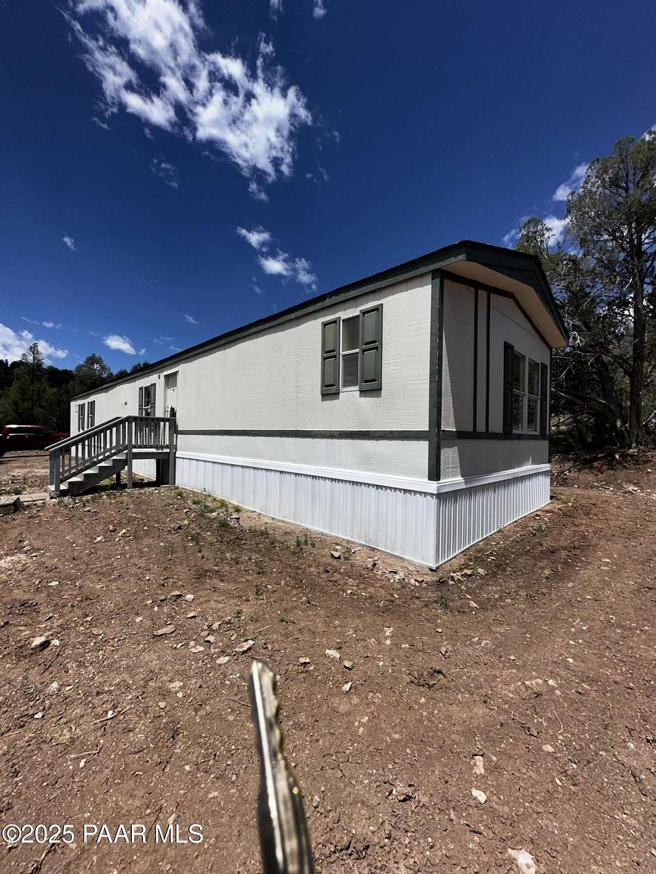 72.4 Acres of Recreational Land with Home for Sale in Seligman, Arizona