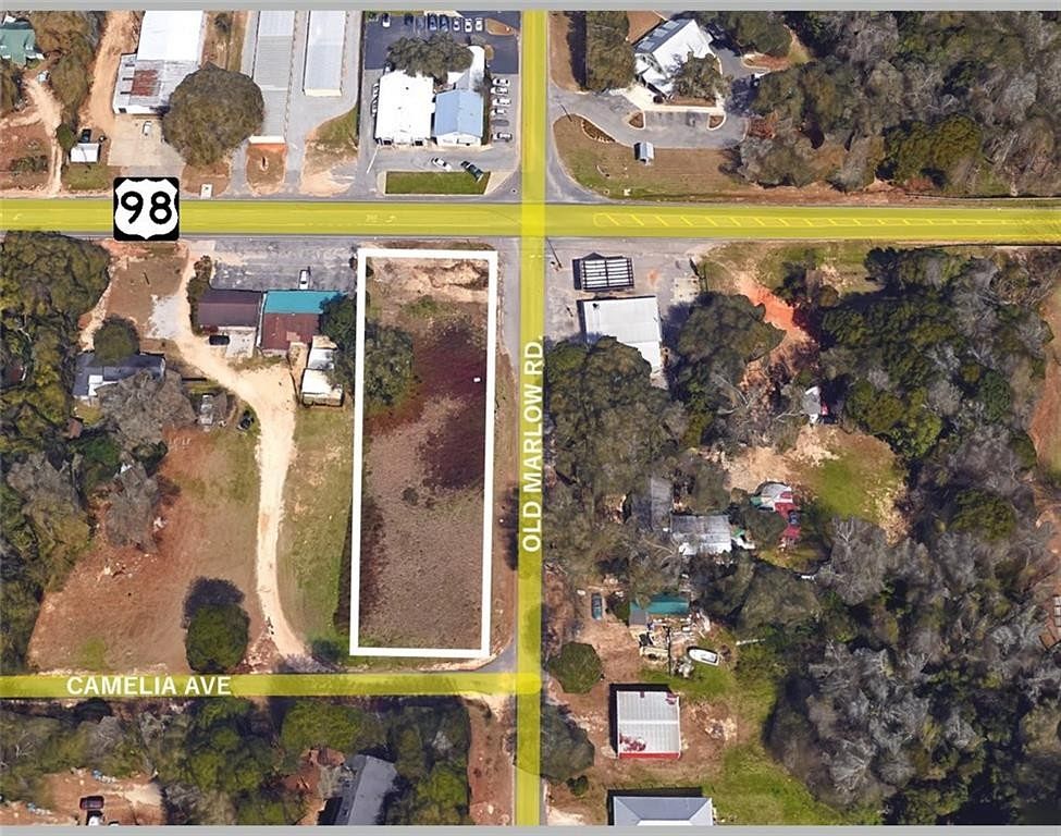 0.69 Acres of Commercial Land for Sale in Magnolia Springs, Alabama