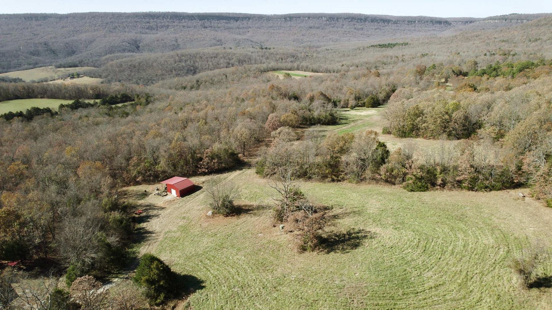 126 Acres of Land with Home for Sale in Marble Falls Township, Arkansas