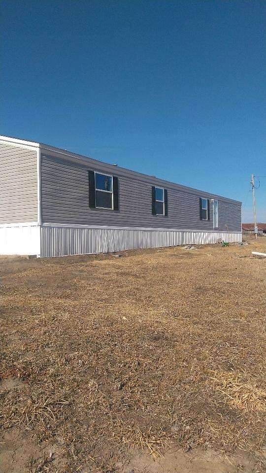 13.1 Acres of Land with Home for Sale in Powersville, Missouri