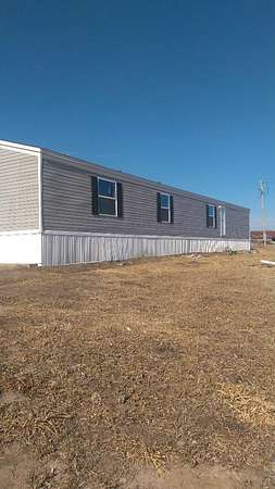 13.1 Acres of Land with Home for Sale in Powersville, Missouri