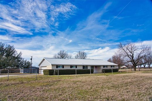 6.5 Acres of Land with Home for Sale in Wolfe City, Texas