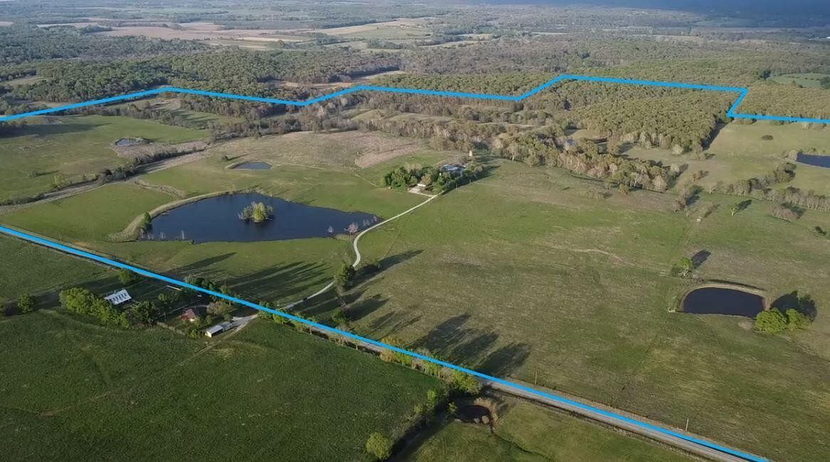 460 Acres of Agricultural Land with Home for Sale in El Dorado Springs, Missouri