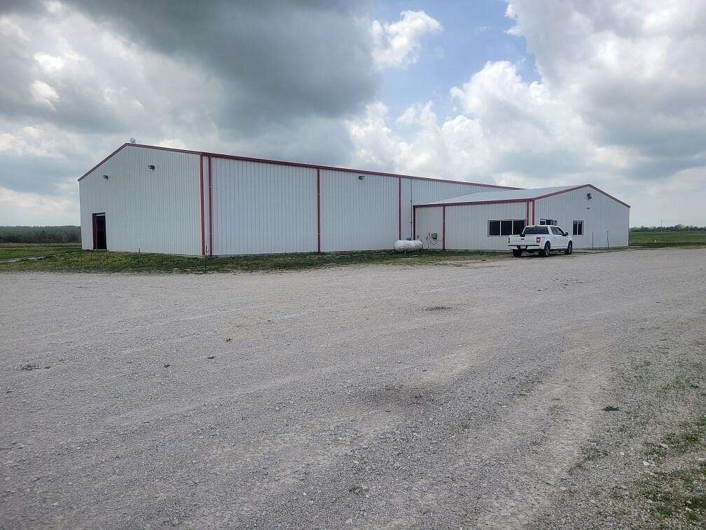 9.8 Acres of Improved Commercial Land for Sale in Bolivar, Missouri