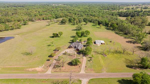 36.4 Acres of Agricultural Land with Home for Sale in Yantis, Texas