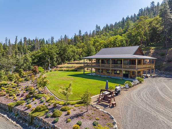 5.2 Acres of Residential Land with Home for Sale in Cave Junction, Oregon