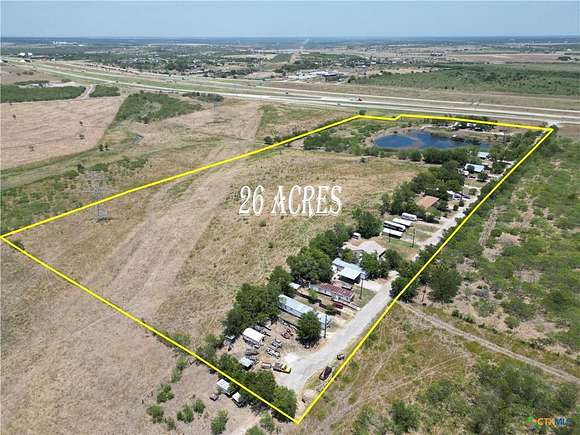 25.989 Acres of Agricultural Land with Home for Sale in Lockhart, Texas