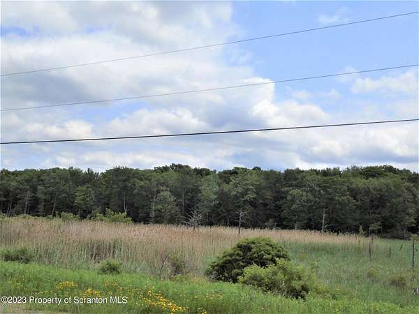 24.8 Acres of Recreational Land for Sale in Roaring Brook Township, Pennsylvania