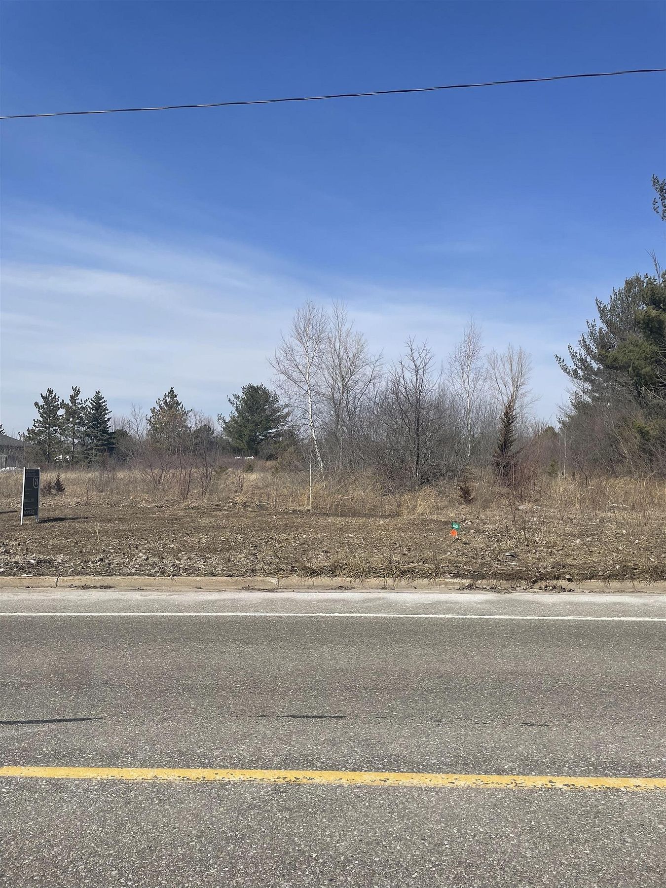 0.88 Acres of Commercial Land for Sale in Midland, Michigan