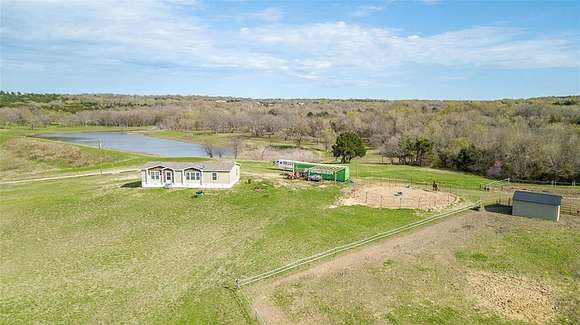 59.5 Acres of Agricultural Land with Home for Sale in Farmersville, Texas