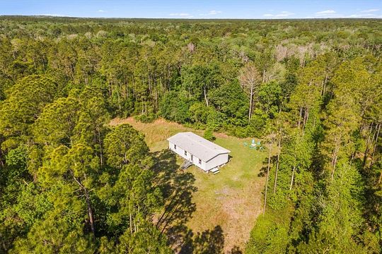 89.9 Acres of Recreational Land with Home for Sale in Chiefland, Florida
