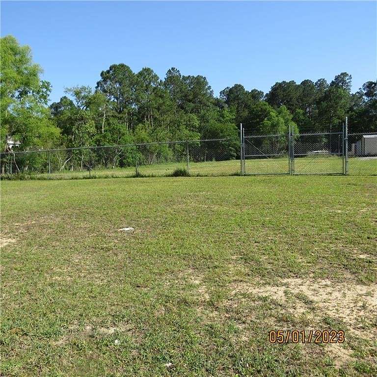 0.86 Acres of Commercial Land for Sale in Theodore, Alabama