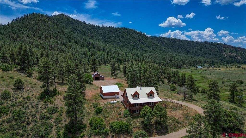 24.59 Acres of Agricultural Land with Home for Sale in Pagosa Springs, Colorado