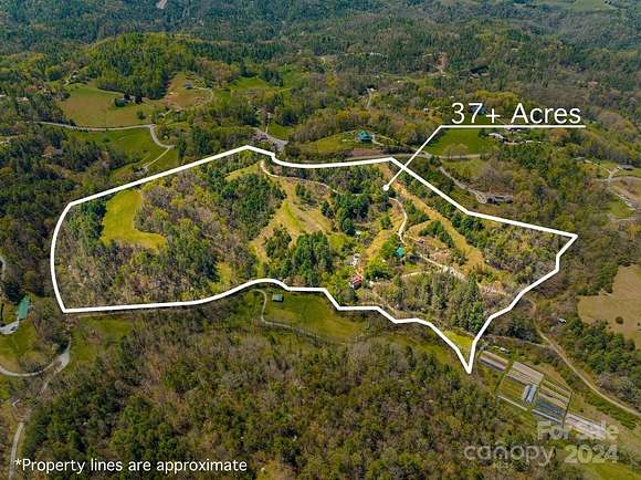 37 Acres of Land with Home for Sale in Marshall, North Carolina