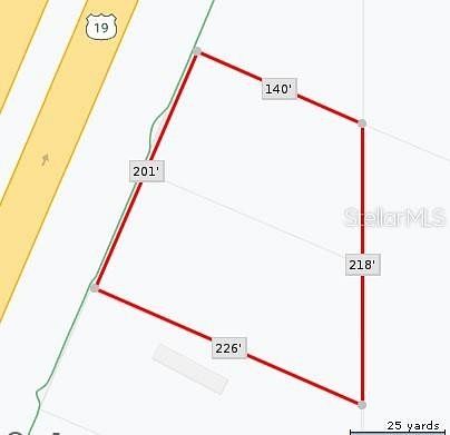 0.84 Acres of Commercial Land for Sale in Hudson, Florida