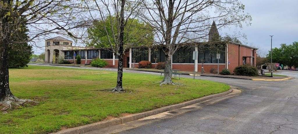 5.5 Acres of Improved Commercial Land for Sale in Snellville, Georgia