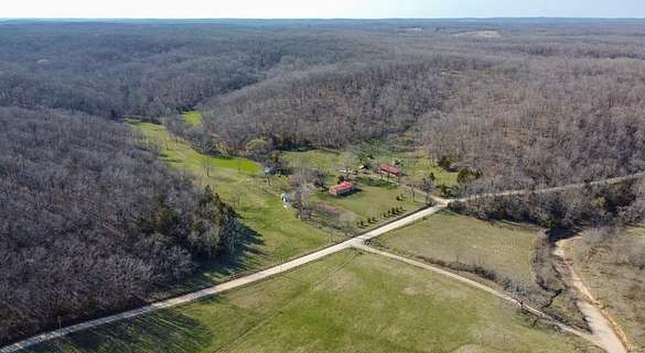 129 Acres of Land with Home for Sale in Waynesville, Missouri