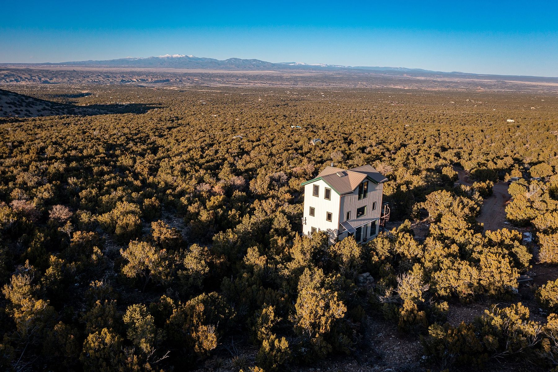 40 Acres of Recreational Land with Home for Sale in Cerrillos, New Mexico