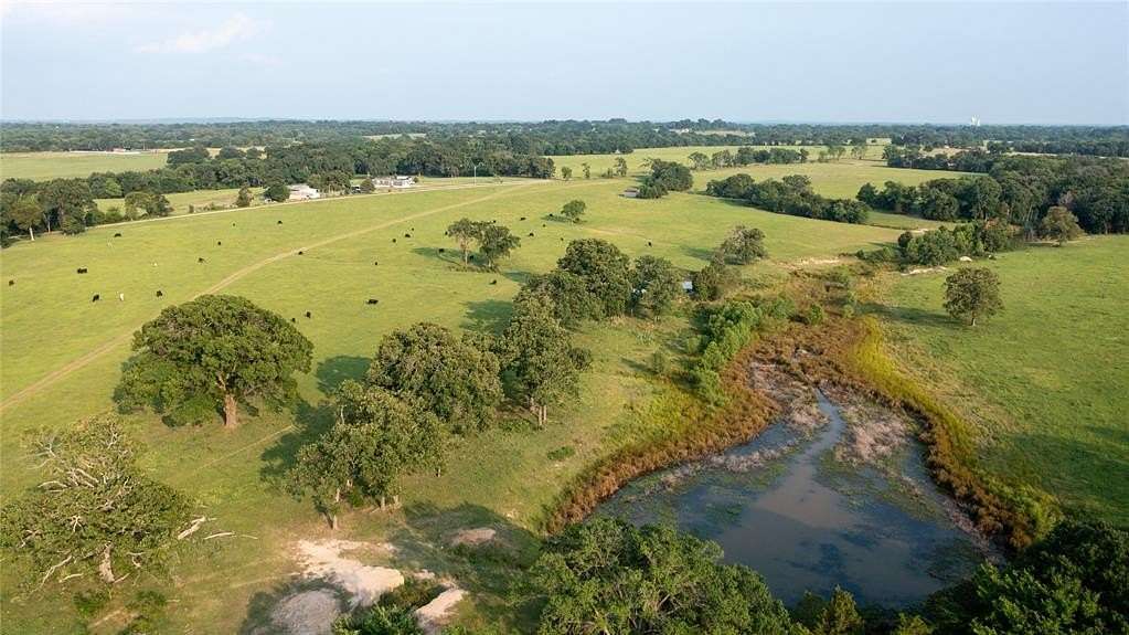 455 Acres of Agricultural Land with Home for Sale in Eustace, Texas