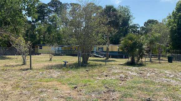 5.1 Acres of Residential Land with Home for Sale in Hudson, Florida