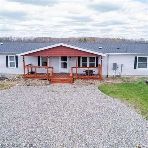 2 Acres of Land with Home for Sale in Dayton Township, Michigan