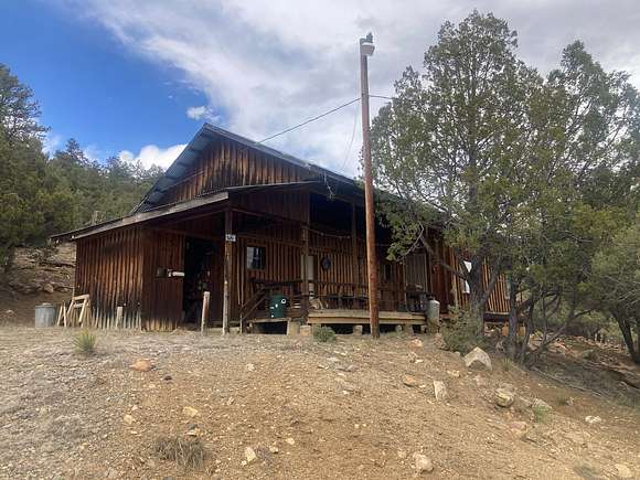2.5 Acres of Land with Home for Sale in Los Ojos, New Mexico