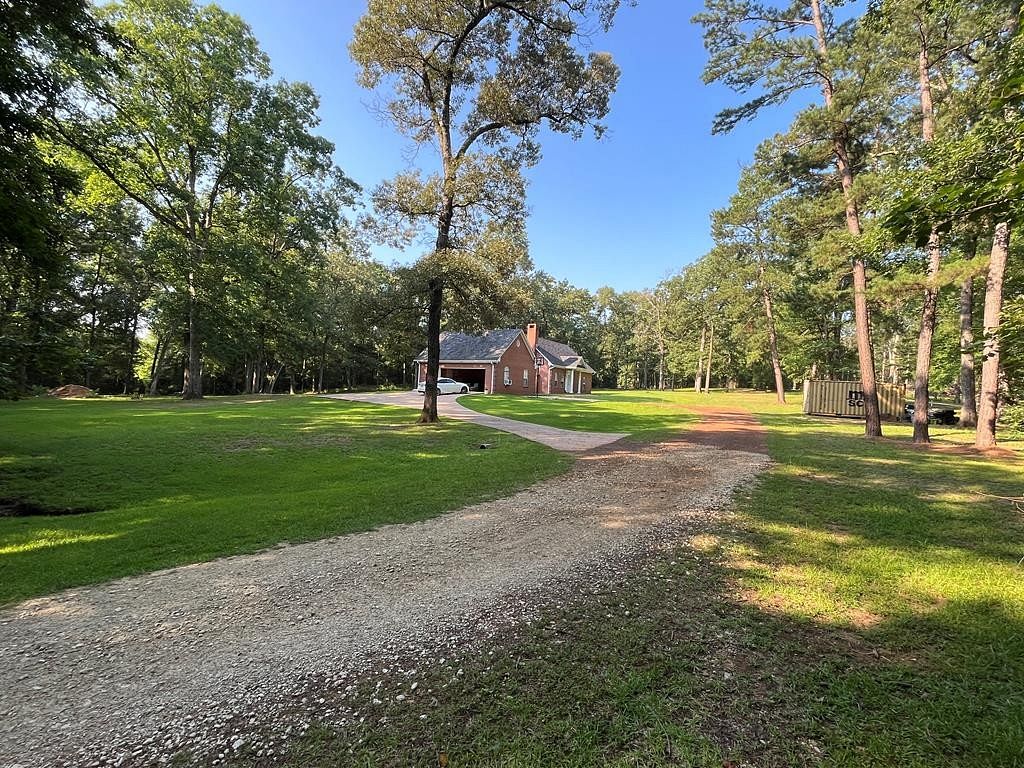 6.7 Acres of Residential Land with Home for Sale in Nacogdoches, Texas