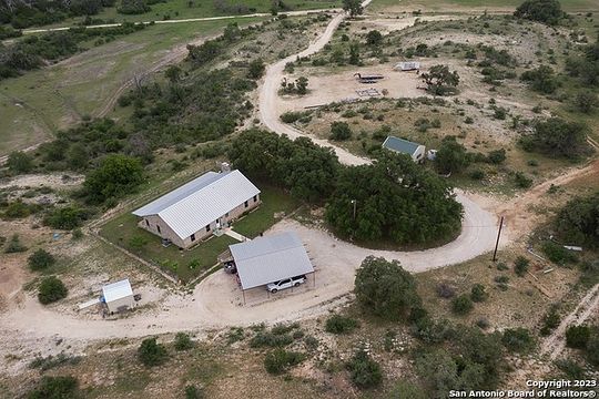 85 Acres of Agricultural Land with Home for Sale in Medina, Texas