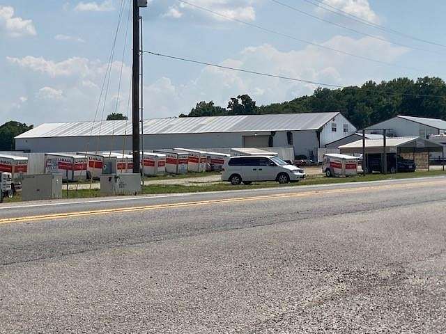 11.7 Acres of Improved Commercial Land for Sale in Gravette, Arkansas