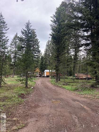 0.83 Acres of Residential Land with Home for Sale in Island Park, Idaho