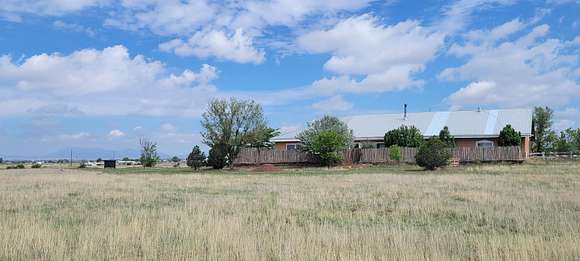 5.7 Acres of Residential Land with Home for Sale in Moriarty, New Mexico
