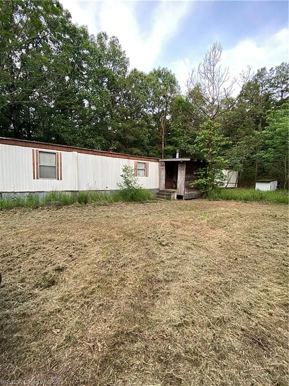 5.1 Acres of Residential Land with Home for Sale in Waldron, Arkansas