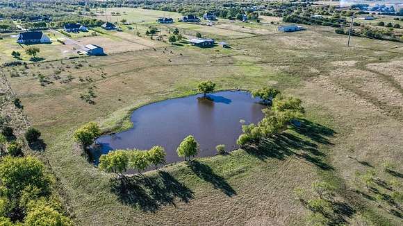 11.2 Acres of Land with Home for Sale in Royse City, Texas