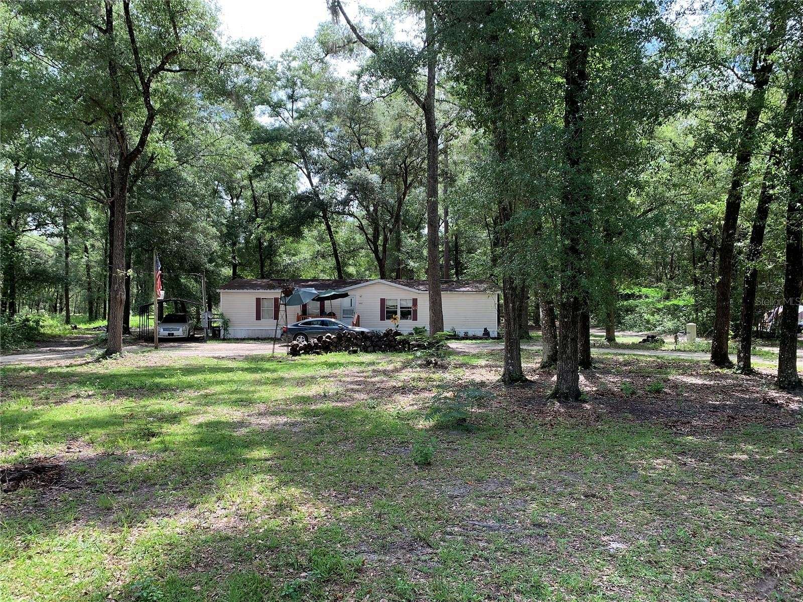 2.4 Acres of Residential Land with Home for Sale in Dunnellon, Florida