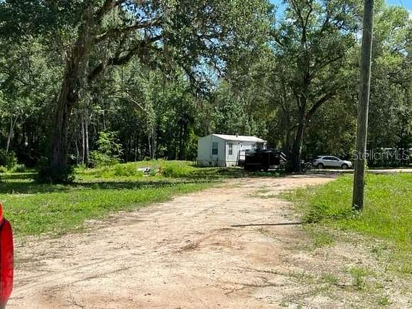 4.1 Acres of Residential Land with Home for Sale in Silver Springs, Florida
