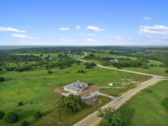 12.19 Acres of Land with Home for Sale in Briggs, Texas