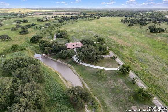 138 Acres of Agricultural Land with Home for Sale in Hondo, Texas