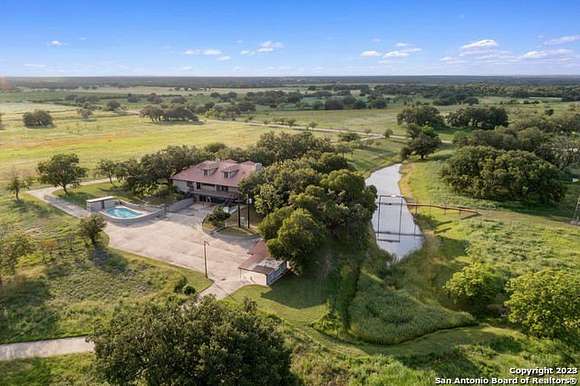 138 Acres of Agricultural Land with Home for Sale in Hondo, Texas