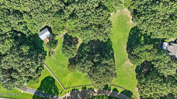 10 Acres of Residential Land with Home for Sale in Madison, Mississippi