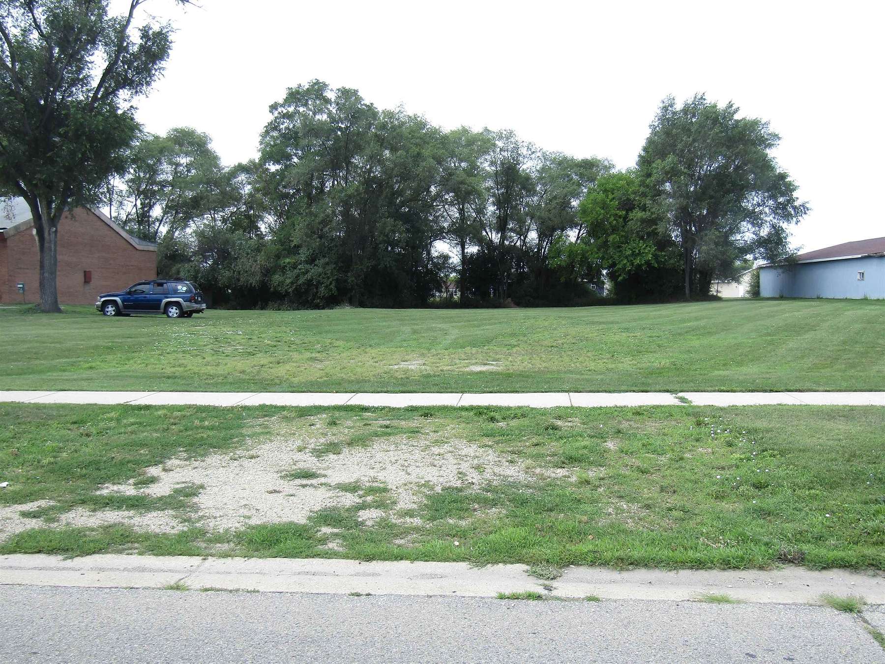 0.72 Acres of Commercial Land for Sale in Janesville, Wisconsin
