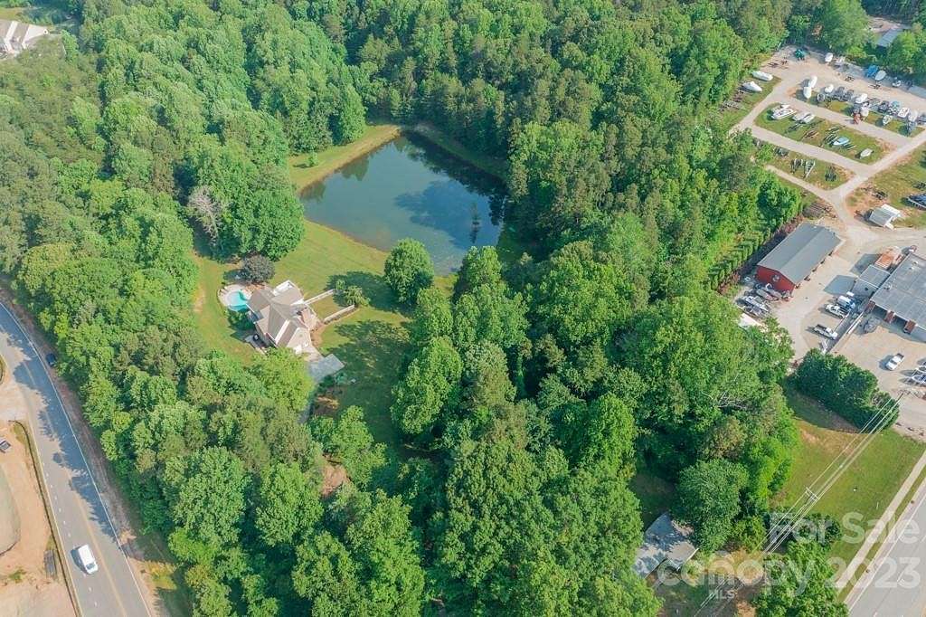 10.6 Acres of Land with Home for Sale in Mooresville, North Carolina