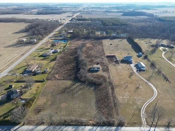 6.9 Acres of Residential Land with Home for Sale in Butler, Indiana