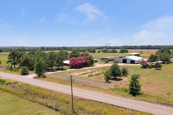 1,873 Acres of Agricultural Land with Home for Sale in Boswell, Oklahoma