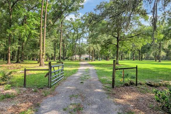 10 Acres of Residential Land with Home for Sale in Oxford, Florida